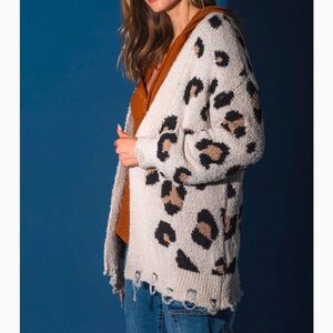 New In L animal print distressed sweater